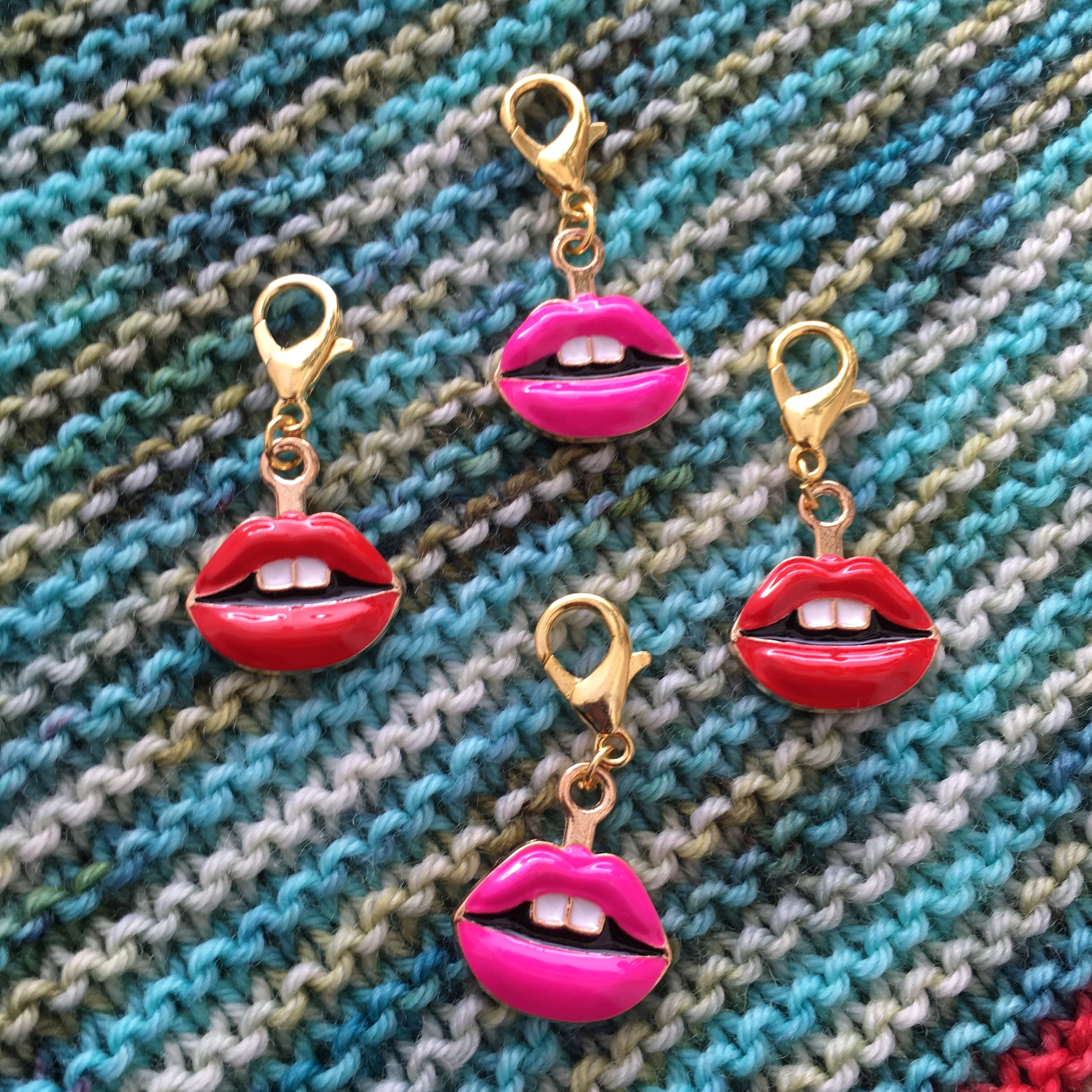 red and pink enamel lips charm on a hanging lbster clasp for knitting and crochet